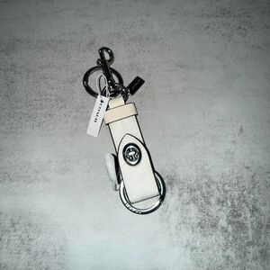 Coach white leather trigger snap keychain fob with silver hardware